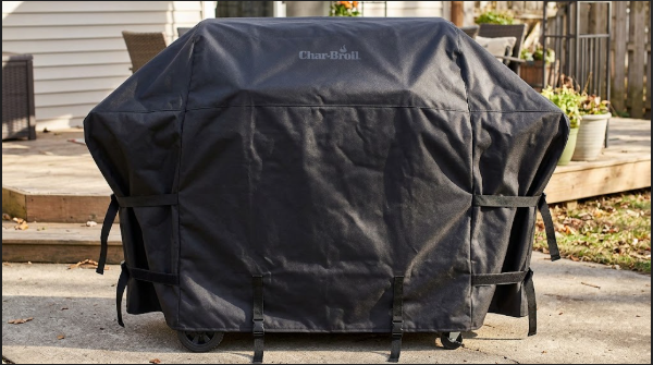 Universal Large cover pulled over a 4-burner Char-Broil gas grill with straps fastened