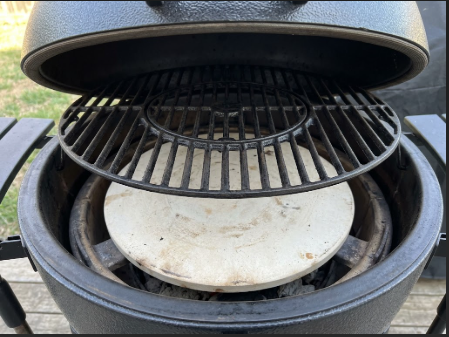  Smokin' Stone seated on the lower ledge with the cast iron grate above it